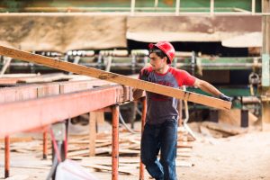 crew working on rough sawn lumber for sale from elders sawmill in rockford michigan. we ship rough sawn lumber to customers all over the world including furniture manufacturers.